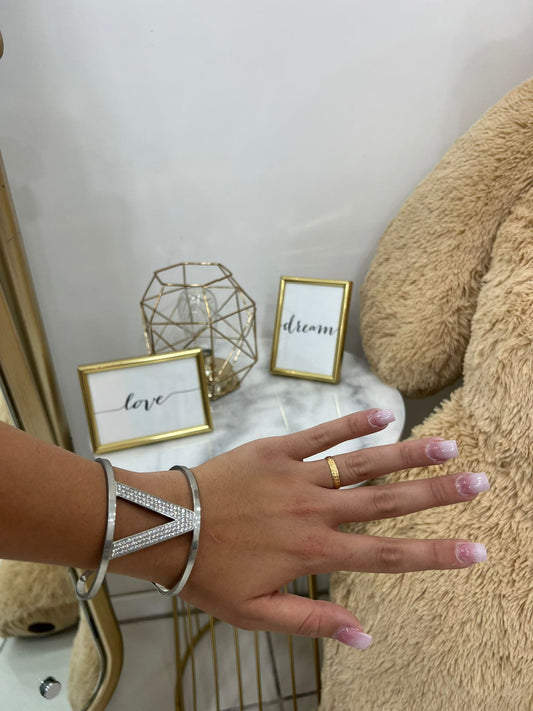 Bracciale rigido a “V”